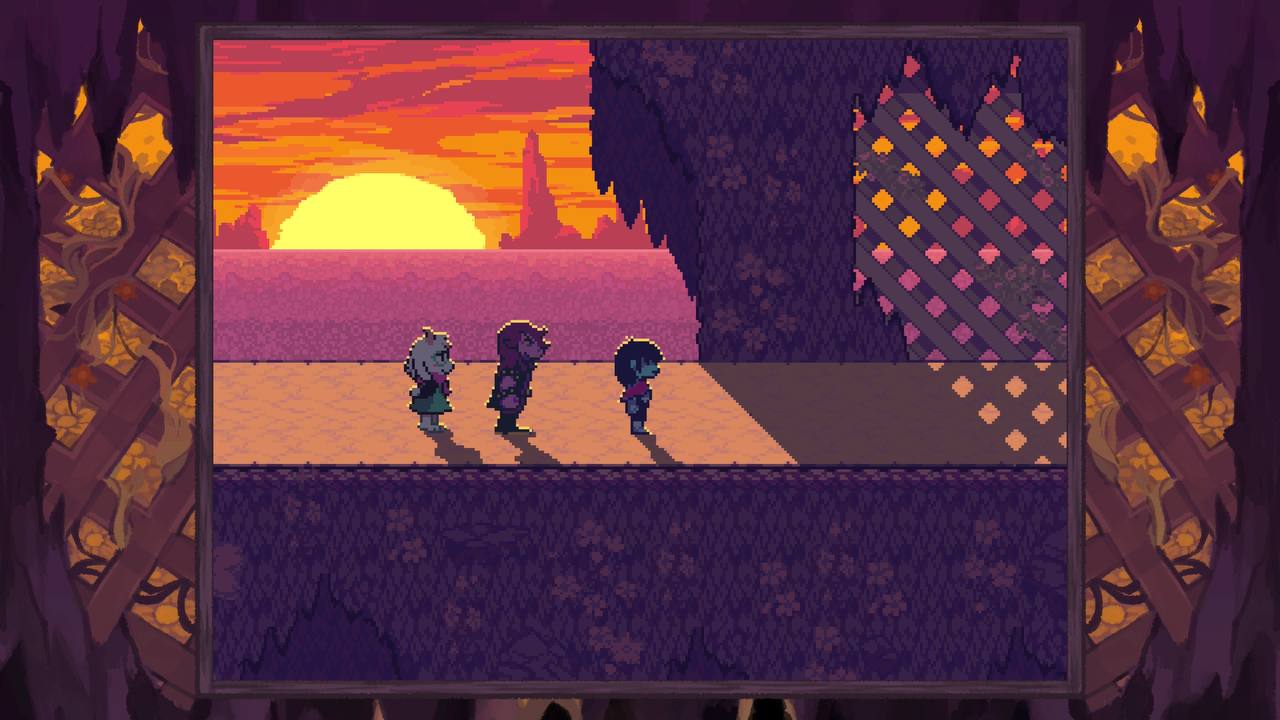 Kris, Suisie, and Raslei stand in the sunset